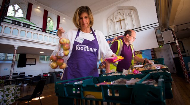 volunteers helping out in foodbank