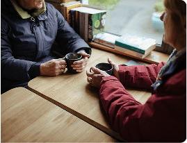 Two women having a chat over a cup of tea